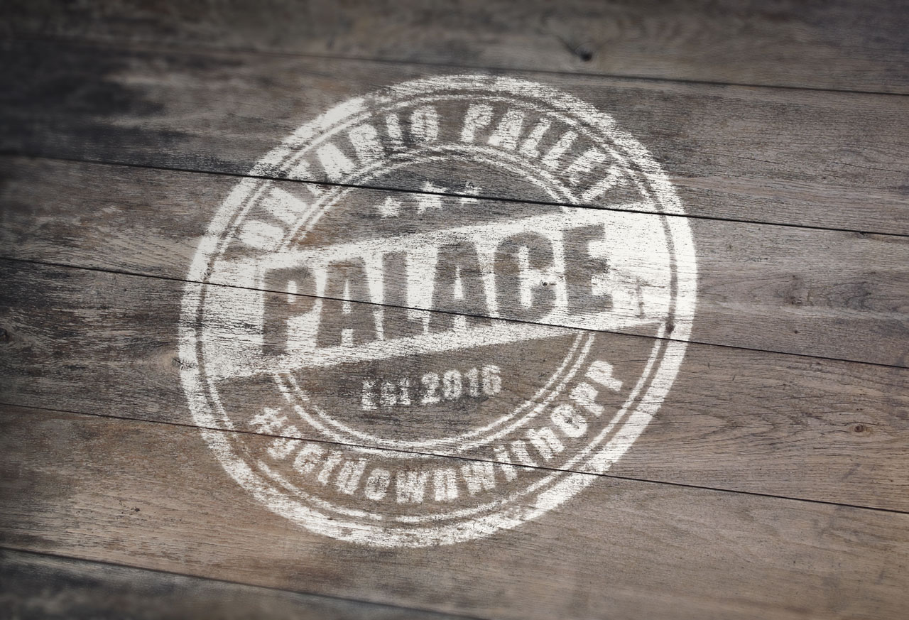 Ontario pallet palace logo design by scr enter dibyendu roy rubber mock up presentation on wooden pallet surface
