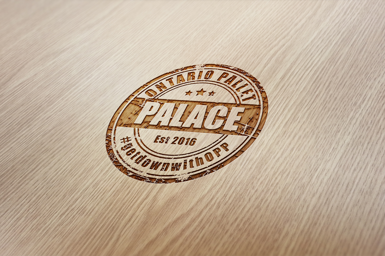 Ontario pallet palace logo design by scr enter dibyendu roy rubber mock up presentation on wooden surface