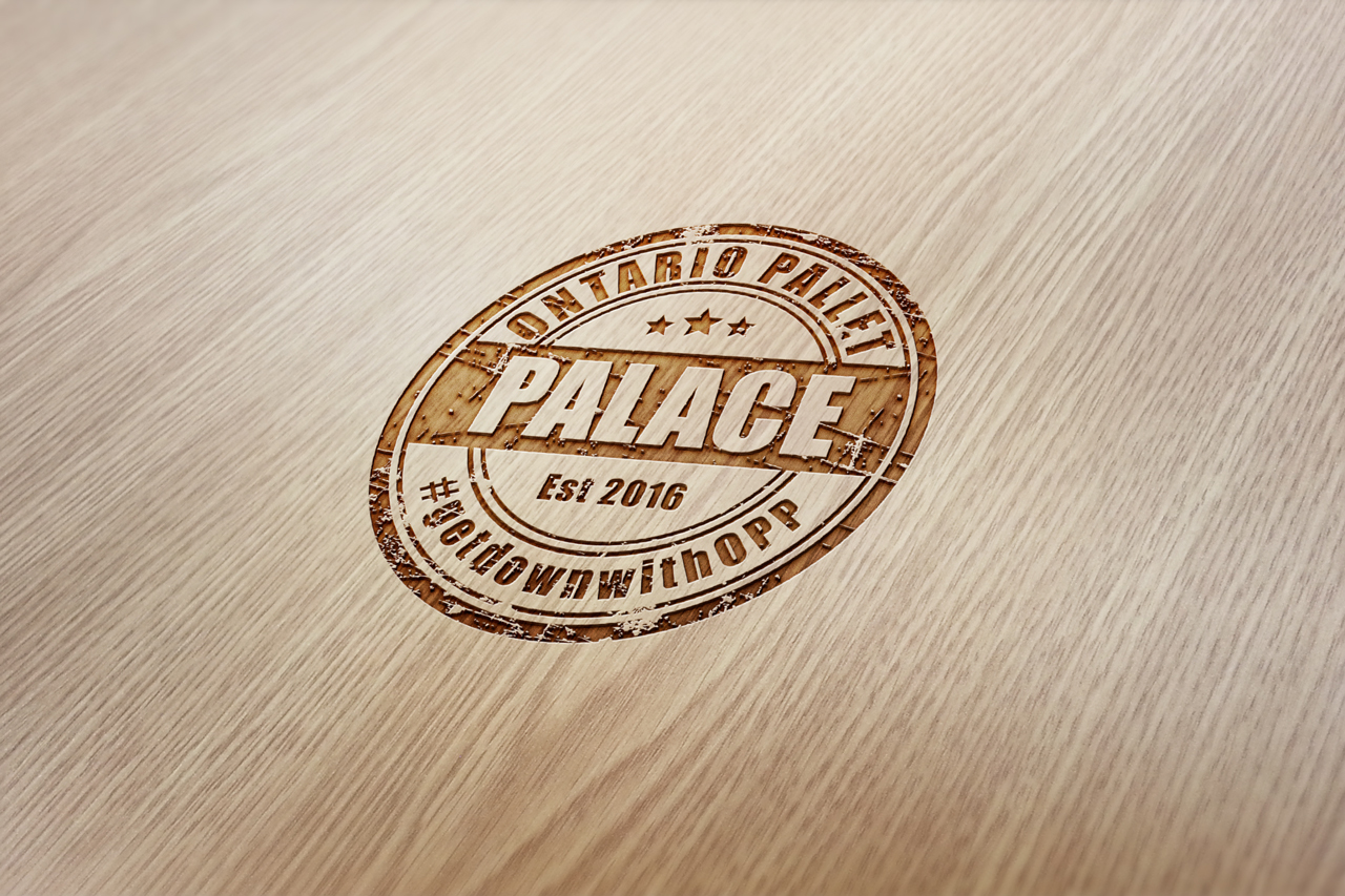 Ontario pallet palace logo design by scr enter dibyendu roy rubber mock up presentation on wooden surface