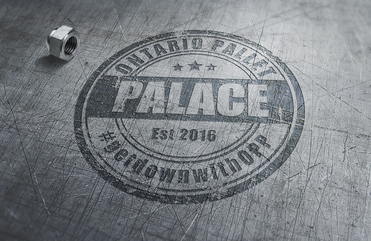 Ontario pallet palace logo design by scr enter dibyendu roy rubber mock up presentation on metal surface